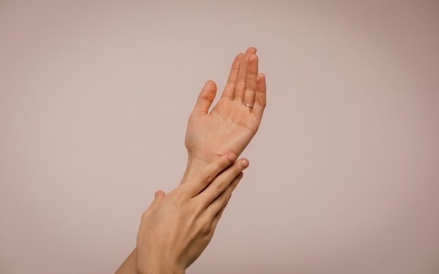 person-touching-hand-1242349-640x400.jpg